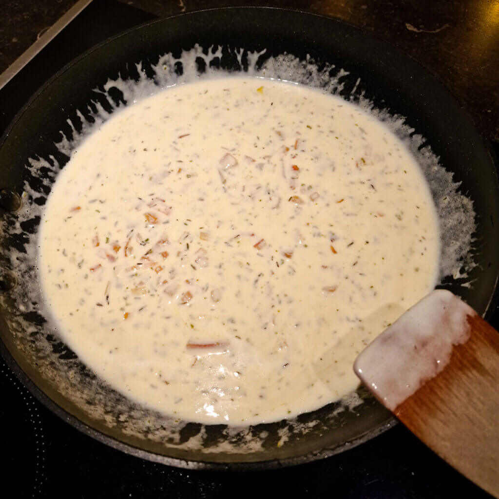 Cream added to the lobster ravioli sauce